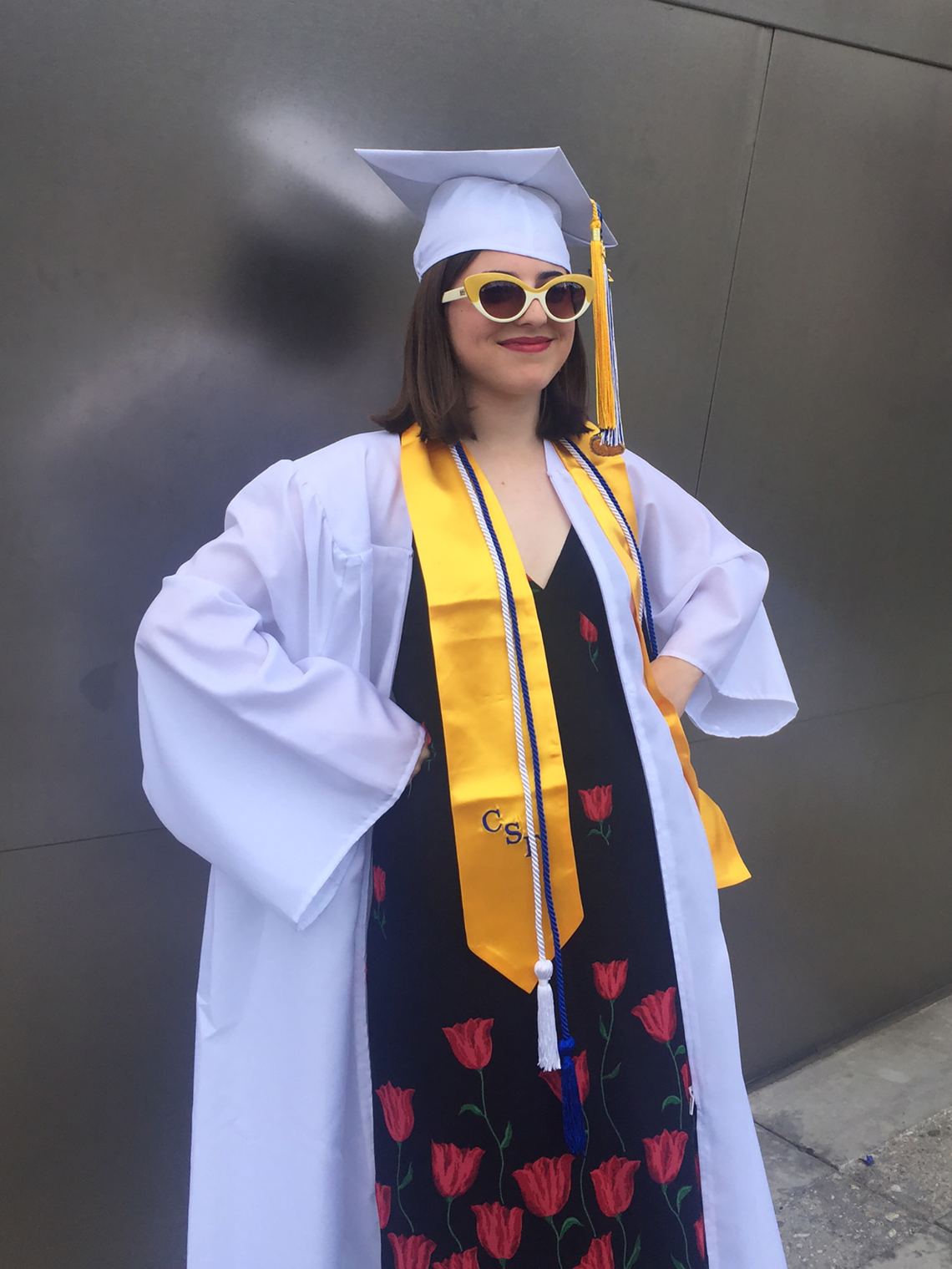 Sofia in her Crap shades at her high school graduation.