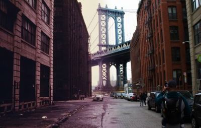 A view of the Manhattan Bridge from Brooklyn, with the view from 1970 on the left and today’s view on the right. Andrew Farris